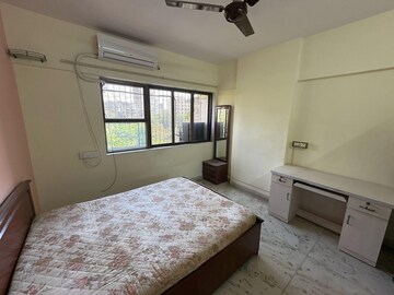 Bedroom in 2 BHK Apartment at Raheja Classique, Andheri West – for Rent