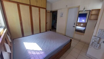 Bedroom in 2 BHK Apartment at Nirmiti Primrose, Baner – for Rent