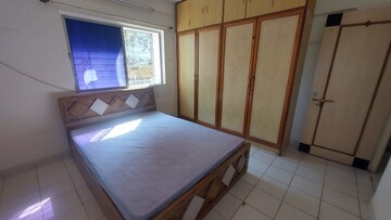 Bedroom in 2 BHK Apartment at Nirmiti Primrose, Baner – for Rent