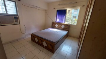 Bedroom in 2 BHK Apartment at Nirmiti Primrose, Baner – for Rent