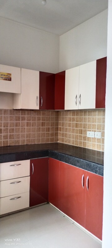 Kitchen in 3 BHK Apartment at Mahagun Mywoods, Sector 16c Greater Noida – for Rent