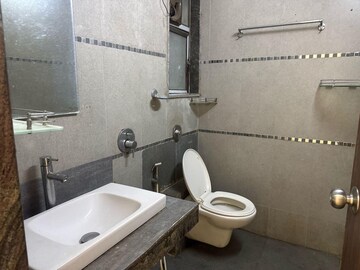 Bathroom in 3 BHK Apartment at Zaveri Ashtavinayak CHS, Andheri West – for Rent