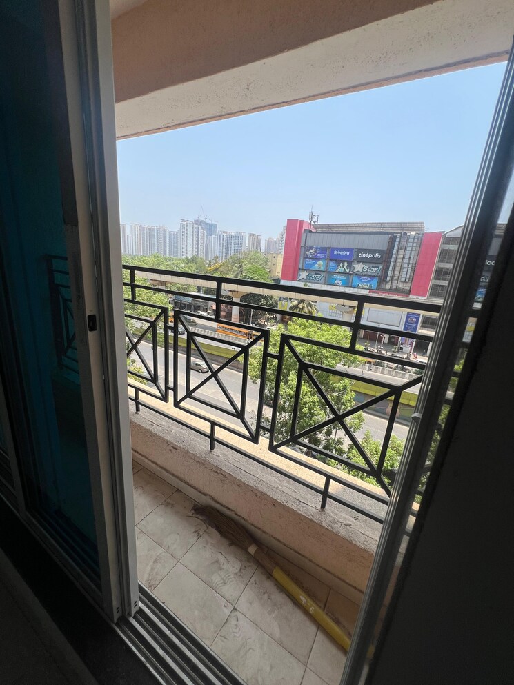Balcony, cosmos-habitat 2 Bedroom 701 Sq.Ft. Apartment In Majiwada Thane 9086672