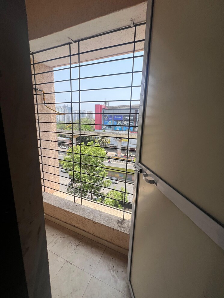Balcony, cosmos-habitat 2 Bedroom 701 Sq.Ft. Apartment In Majiwada Thane 9086715