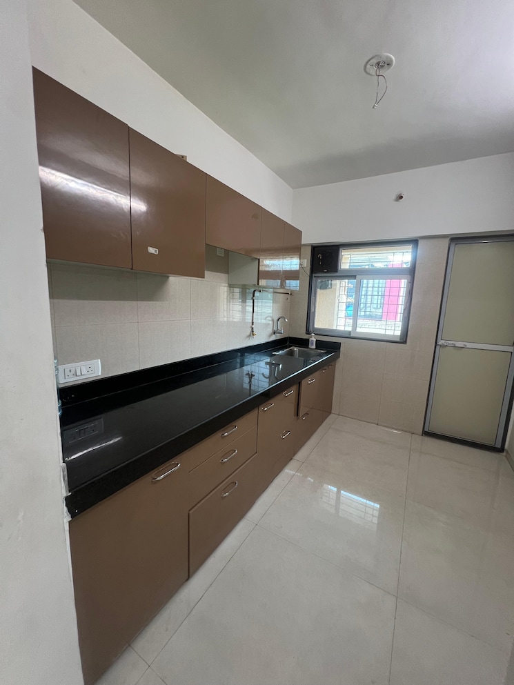 Kitchen, cosmos-habitat 2 Bedroom 701 Sq.Ft. Apartment In Majiwada Thane 9086811