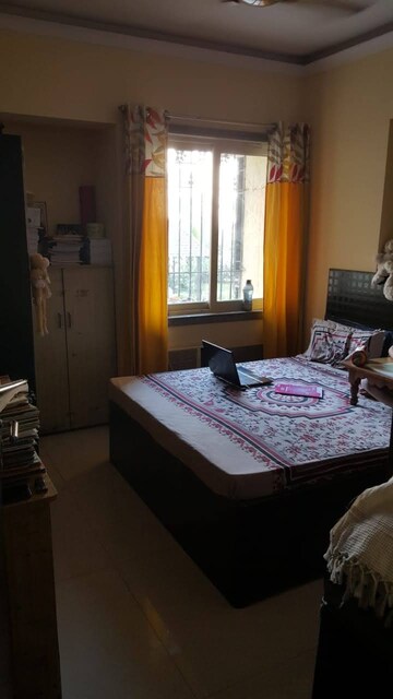 Bedroom in 2 BHK Apartment at Highland Residency CHSL, Balkum Pada – for Sale