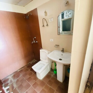 Bathroom in 2 BHK Apartment at Aims Golf Avenue II, Sector 75 – for Rent