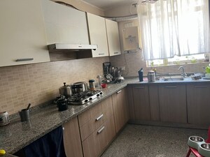Kitchen in 2 BHK Apartment at Raheja Vedaanta, Sector 108 – for Sale