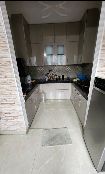 Kitchen in 2 BHK Builder Floor at Freedom Fighters Enclave – for Rent