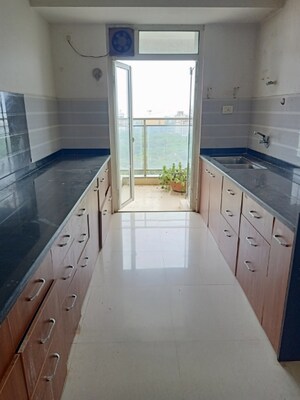 Kitchen in 3 BHK Apartment at Omkar Veda Exclusive, Parel – for Sale