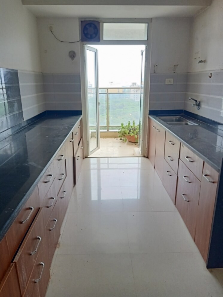 Kitchen, omkar-veda-exclusive 3 Bedroom 1300 Sq.Ft. Apartment In Parel Mumbai 9087106