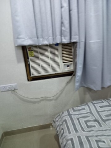 Bedroom in 2 BHK Apartment at Dheeraj Godavari Apartment, Malad West – for Rent