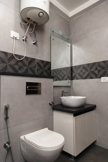 Bathroom in 4 BHK Builder Floor at Chattarpur – for Rent