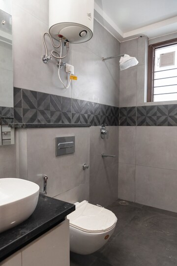 Bathroom in 4 BHK Builder Floor at Chattarpur – for Rent