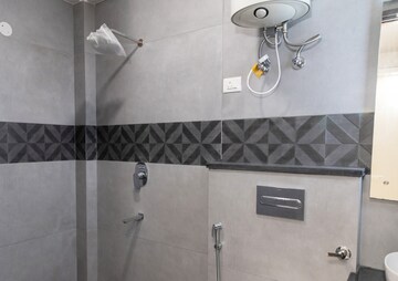 Bathroom in 4 BHK Builder Floor at Chattarpur – for Rent