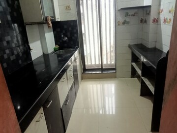 Kitchen in 1 BHK Apartment at Salasar Aangan, Mira Road – for Rent