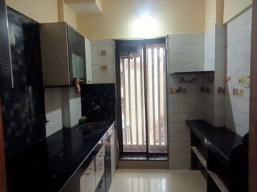 Kitchen in 1 BHK Apartment at Salasar Aangan, Mira Road – for Rent