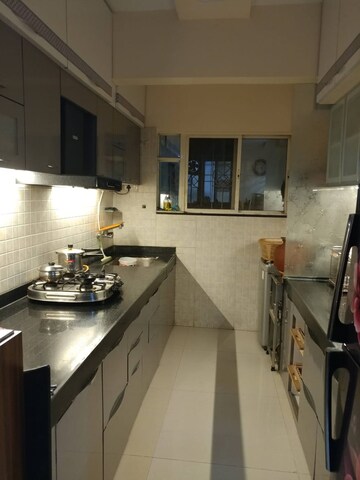 Kitchen in 2 BHK Apartment at G K Jarvari, Pimple Saudagar – for Rent