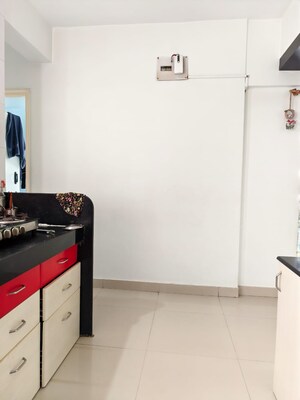 Kitchen in 2 BHK Apartment at Ramkrishna Paradise, Dhayari – for Sale