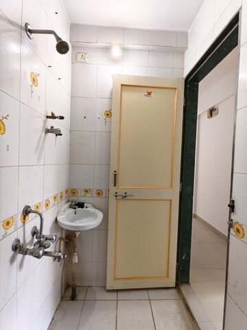 Bathroom in 2 BHK Apartment at Ramkrishna Paradise, Dhayari – for Sale