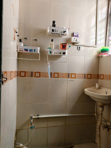 Bathroom in 2 BHK Apartment at Ramkrishna Paradise, Dhayari – for Sale