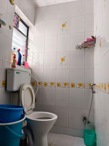Bathroom in 2 BHK Apartment at Ramkrishna Paradise, Dhayari – for Sale