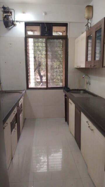 Kitchen in 3 BHK Apartment at Safal Nav Parmanu CHS, Chembur – for Rent