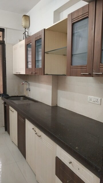 Kitchen in 3 BHK Apartment at Safal Nav Parmanu CHS, Chembur – for Rent
