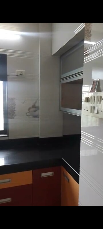Kitchen in 3 BHK Apartment at Green Acres Apartment, Waghbil – for Sale