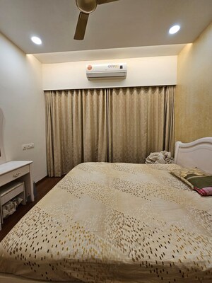 Bedroom in 2 BHK Apartment at Divine Ambrosia Apartment, Borivali East – for Sale