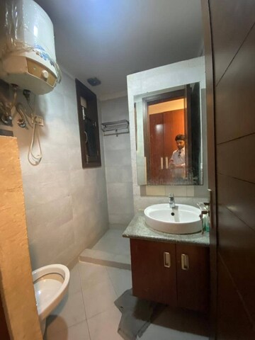 Bathroom in 3 BHK Apartment at Freedom Fighters Enclave – for Rent