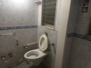 Bathroom in 1 BHK Apartment at Asmita Jyoti CHS, Malad West – for Rent