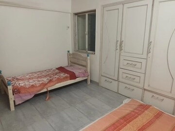 Bedroom in 1 BHK Apartment at Asmita Jyoti CHS, Malad West – for Rent