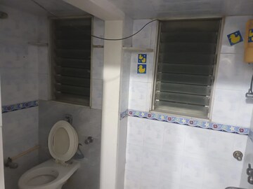 Bathroom in 1 BHK Apartment at Asmita Jyoti CHS, Malad West – for Rent