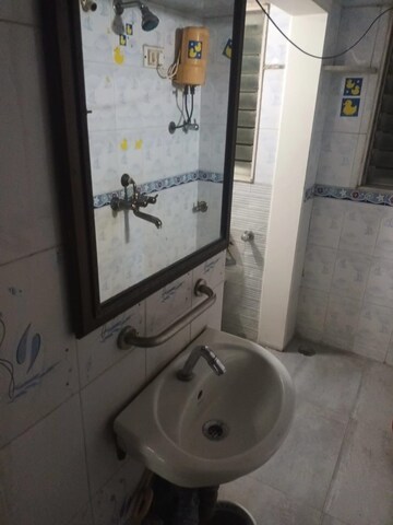 Bathroom in 1 BHK Apartment at Asmita Jyoti CHS, Malad West – for Rent