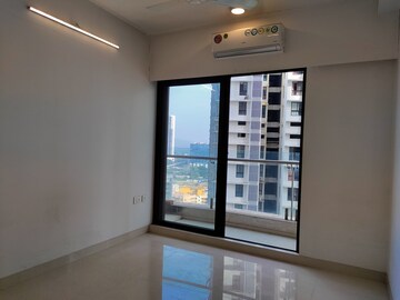 Room in 3 BHK Apartment at Sunteck City Avenue 1, Goregaon West – for Rent