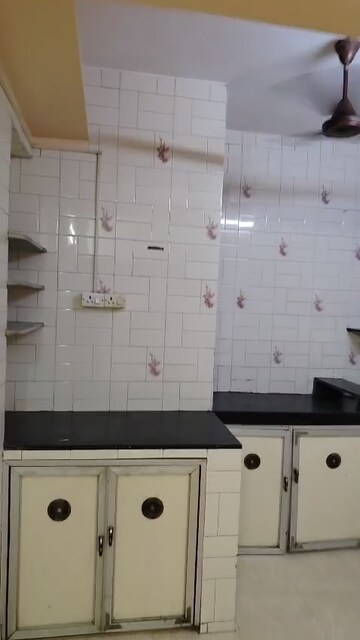 Kitchen in 1 BHK Apartment at Marzban CHS, Vile Parle East – for Rent