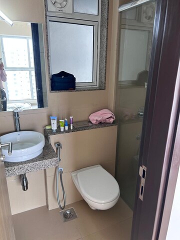 Bathroom in 1 BHK Apartment at Kanakia Rainforest, Andheri East – for Rent