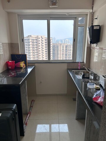 Kitchen in 1 BHK Apartment at Kanakia Rainforest, Andheri East – for Rent