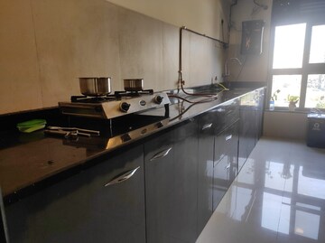 Kitchen in 2 BHK Apartment at Rhythm Serenity Heights, Andheri East – for Rent
