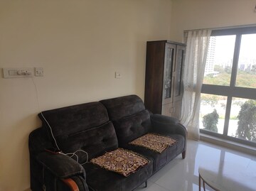 Living Room in 2 BHK Apartment at Rhythm Serenity Heights, Andheri East – for Rent