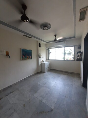 Living Room in 1 BHK Apartment at Highland Complex, Kandivali West – for Rent