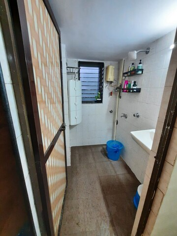 Attached Bathroom in 1 BHK Apartment at Highland Complex, Kandivali West – for Rent