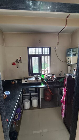 Kitchen in 1 BHK Apartment at Dosti Desire Joy, Brahmand – for Sale
