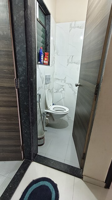 Bathroom in 1 BHK Apartment at Dosti Desire Joy, Brahmand – for Sale