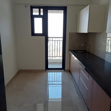 Kitchen in 2.5 BHK Apartment at MICL Aaradhya Highpark Project 2 Of Phase 1, Penkarpada – for Rent