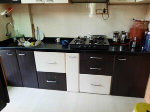 Kitchen in 2 BHK Apartment at Sunshine Tower Koper khairane, Kopar Khairane – for Sale