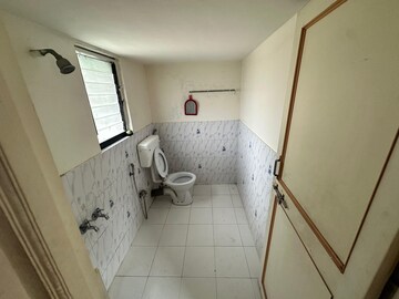 Bathroom in 2 BHK Apartment at Samarth Srushti, Wireless Colony – for Rent