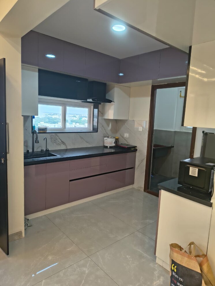 Kitchen, hallmark-skyrena 3 Bedroom 1935 Sq.Ft. Apartment In Narsingi Hyderabad 9088367