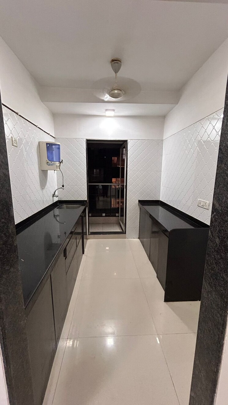 Kitchen, man-opus 1 Bedroom 450 Sq.Ft. Apartment In Mira Road Thane 9088450